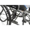 An-ultra-lite-manual-wheelchair-being-maneuvered-smoothly-on-an-outdoor-paved-walkway-in-Ontario-motion-care-mobility-inc.